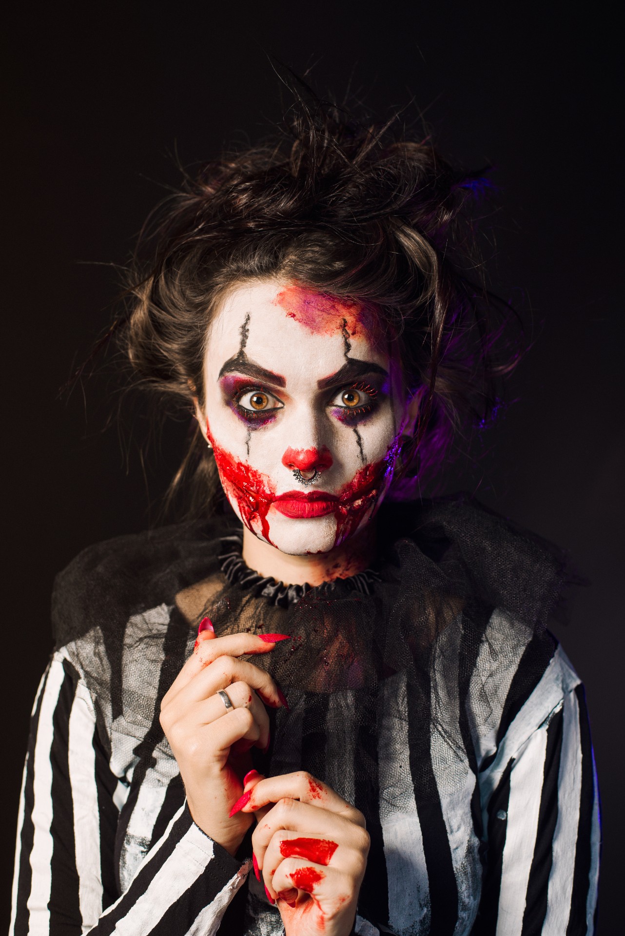 a woman in scary halloween makeup