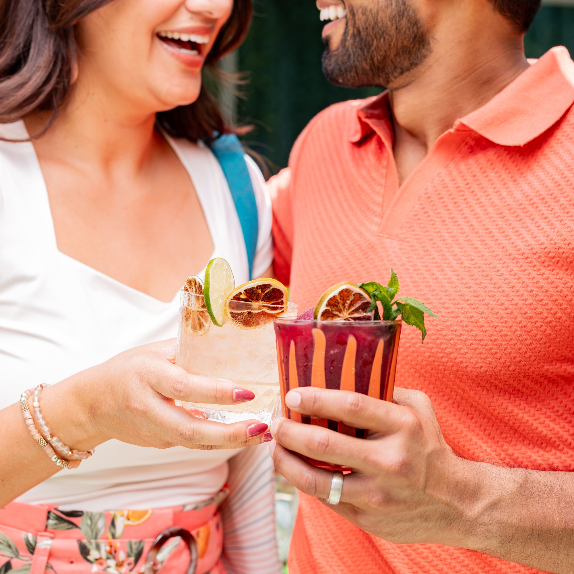 Couple drinking tropical cocktails