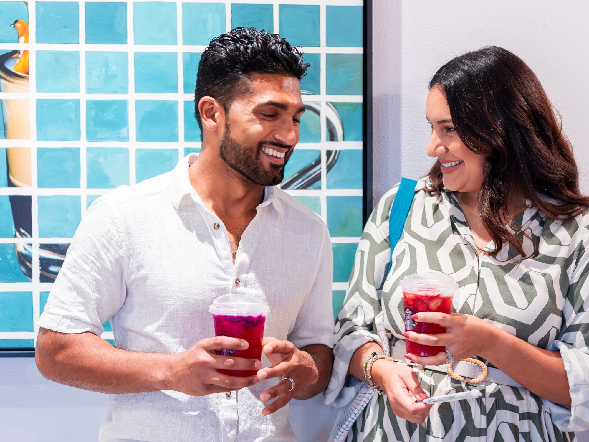 A couple enjoying juice at Orly's Market